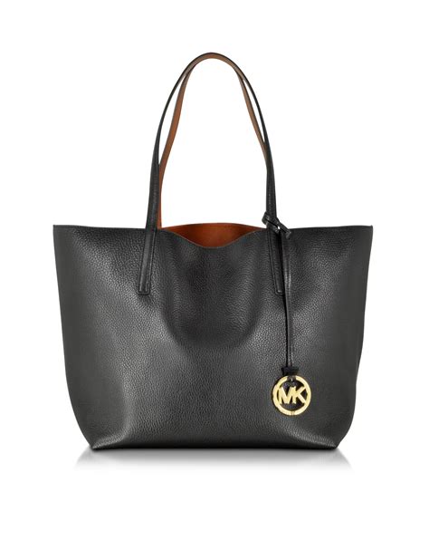 michael kors reversible tote black|Michael Kors black shoulder handbags.